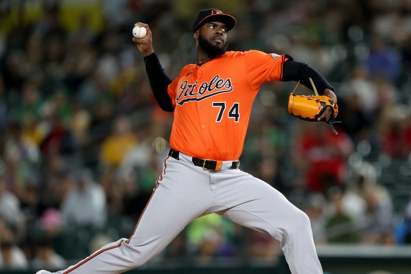 Jun 7, 2025; West Sacramento, California, USA; Baltimore Orioles pitcher Felix Bautista (74) throws a pitch against the Athletics during the ninth inning at Sutter Health Park. Mandatory Credit: Dennis Lee-Imagn Images