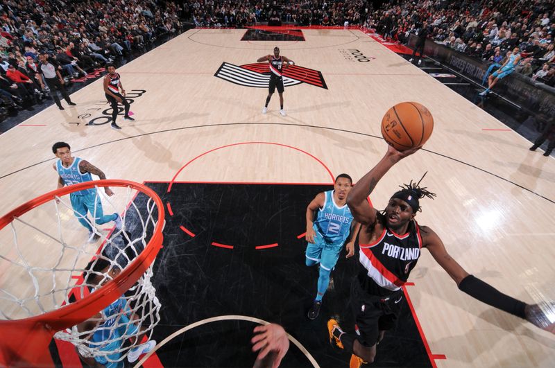 PORTLAND, OR - FEBRUARY 25:  Jerami Grant #9 of the Portland Trail Blazers goes to the basket during the game on February 25, 2024 at the Moda Center Arena in Portland, Oregon. NOTE TO USER: User expressly acknowledges and agrees that, by downloading and or using this photograph, user is consenting to the terms and conditions of the Getty Images License Agreement. Mandatory Copyright Notice: Copyright 2024 NBAE (Photo by Cameron Browne/NBAE via Getty Images)