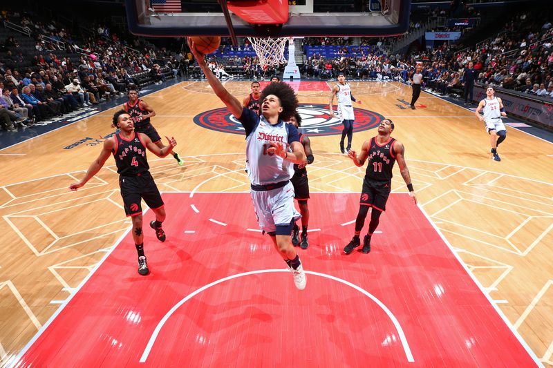 WASHINGTON, DC -?JANUARY 29: Kyshawn George #18 of the Washington Wizards drives to the basket during the game against the Toronto Raptors on January 29, 2025 at Capital One Arena in Washington, DC. NOTE TO USER: User expressly acknowledges and agrees that, by downloading and or using this Photograph, user is consenting to the terms and conditions of the Getty Images License Agreement. Mandatory Copyright Notice: Copyright 2025 NBAE (Photo by Stephen Gosling/NBAE via Getty Images)