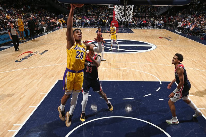 WASHINGTON, DC -? APRIL 4: Rui Hachimura #28 of the Los Angeles Lakers drives to the basket during the game against the Washington Wizards on April 4, 2024 at Capital One Arena in Washington, DC. NOTE TO USER: User expressly acknowledges and agrees that, by downloading and or using this Photograph, user is consenting to the terms and conditions of the Getty Images License Agreement. Mandatory Copyright Notice: Copyright 2024 NBAE (Photo by Kenny Giarla/NBAE via Getty Images)