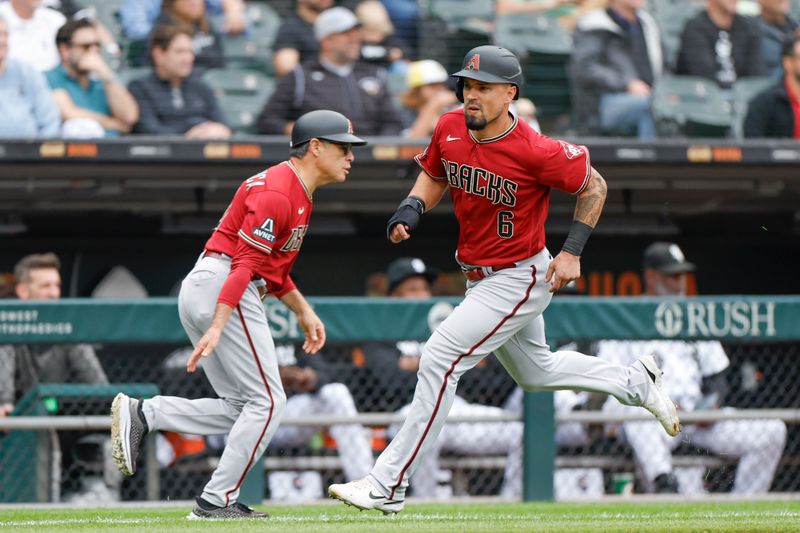 Sep 27, 2023; Chicago, Illinois, USA; Arizona Diamondbacks third baseman Jace Peterson (6) runs to score against the Chicago White Sox during the third inning at Guaranteed Rate Field. Mandatory Credit: Kamil Krzaczynski-USA TODAY Sports