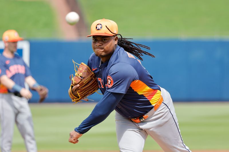 Feb 26, 2025; West Palm Beach, Florida, USA; Houston Astros pitcher Framber Valdez (59) throws a pitch during the first inning against the Washington Nationals at CACTI Park of the Palm Beaches. Mandatory Credit: Reinhold Matay-Imagn Images