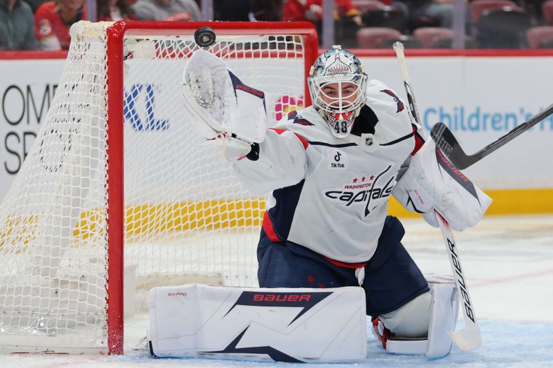 Nov 13, 2025; Sunrise, Florida, USA; Washington Capitals goaltender Logan Thompson (48) makes a save against the Florida Panthers during the second period at Amerant Bank Arena. Mandatory Credit: Sam Navarro-Imagn Images