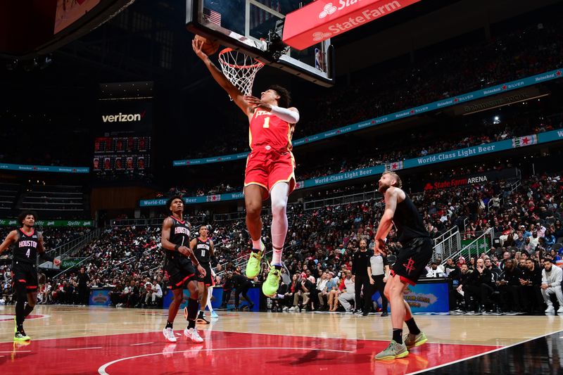 ATLANTA, GA - FEBRUARY 10: Jalen Johnson #1 of the Atlanta Hawks drives to the basket during the game against the Houston Rockets on February 10, 2024 at State Farm Arena in Atlanta, Georgia.  NOTE TO USER: User expressly acknowledges and agrees that, by downloading and/or using this Photograph, user is consenting to the terms and conditions of the Getty Images License Agreement. Mandatory Copyright Notice: Copyright 2024 NBAE (Photo by Scott Cunningham/NBAE via Getty Images)