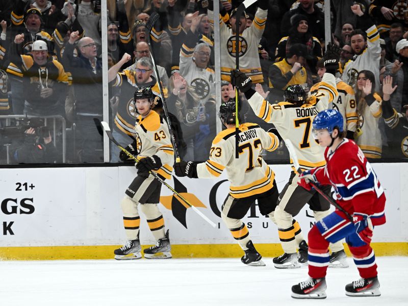 Jan 20, 2024; Boston, Massachusetts, USA; Boston Bruins left wing Danton Heinen (43) celebrates with his teammates after a goal against the Montreal Canadiens during the second period at the TD Garden. Mandatory Credit: Brian Fluharty-USA TODAY Sports