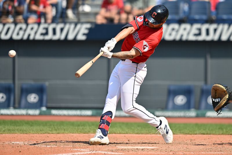 Aug 3, 2025; Cleveland, Ohio, USA; Cleveland Guardians designated hitter C.J. Kayfus (63) hits a double during the ninth inning at Progressive Field. Mandatory Credit: Ken Blaze-Imagn Images
