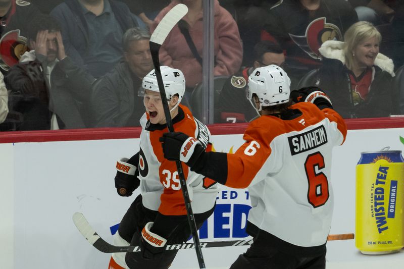 Nov 14, 2024; Ottawa, Ontario, CAN; Philadelphia Flyers right wing Matvei Michkov (39) celebrates with defenseman Travis Sanheim (6) his goal scored in overtime against the Ottawa Senators at the Canadian Tire Centre. Mandatory Credit: Marc DesRosiers-Imagn Images