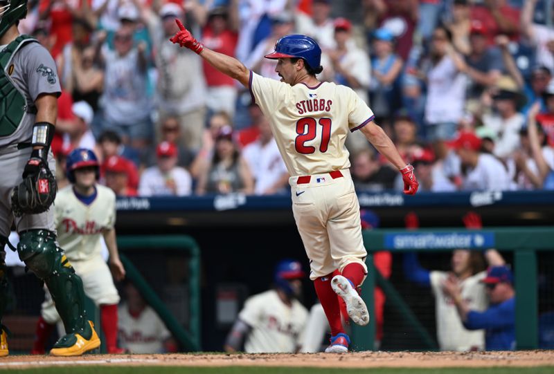 Jul 13, 2024; Philadelphia, Pennsylvania, USA; Philadelphia Phillies catcher Garrett Stubbs (21) reacts after scoring against the Oakland Athletics in the third inning at Citizens Bank Park. Mandatory Credit: Kyle Ross-USA TODAY Sports