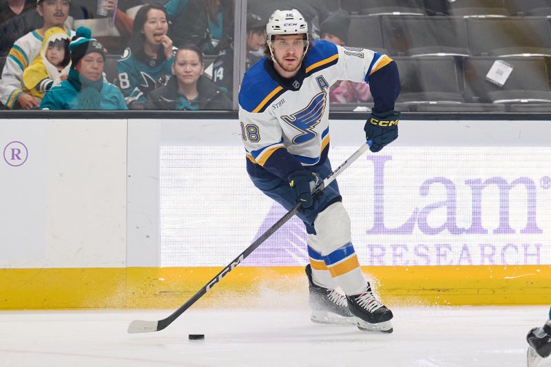 Nov 16, 2023; San Jose, California, USA; St. Louis Blues center Robert Thomas (18) skates with the puck against the San Jose Sharks during the first period at SAP Center at San Jose. Mandatory Credit: Robert Edwards-USA TODAY Sports