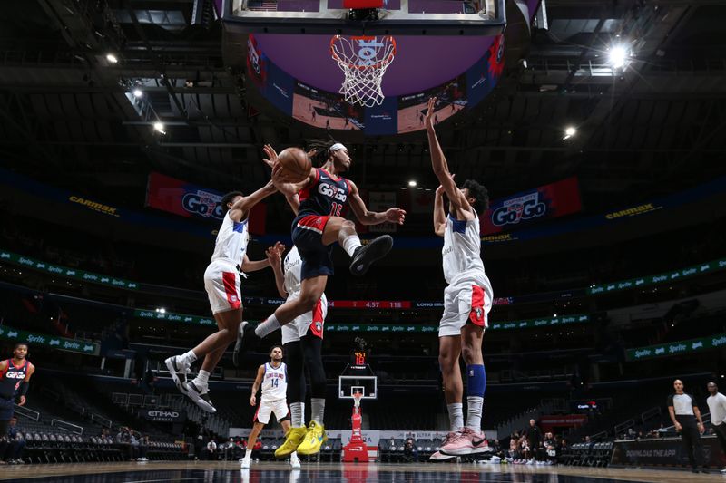 WASHINGTON, DC -? MARCH 8:  Devon Dotson #15 of the Capital City Go-Go passes the ball during the game against the Long Island Nets on March 8, 2024 at Capital One Arena in Washington, DC. NOTE TO USER: User expressly acknowledges and agrees that, by downloading and or using this Photograph, user is consenting to the terms and conditions of the Getty Images License Agreement. Mandatory Copyright Notice: Copyright 2024 NBAE (Photo by Stephen Gosling/NBAE via Getty Images)