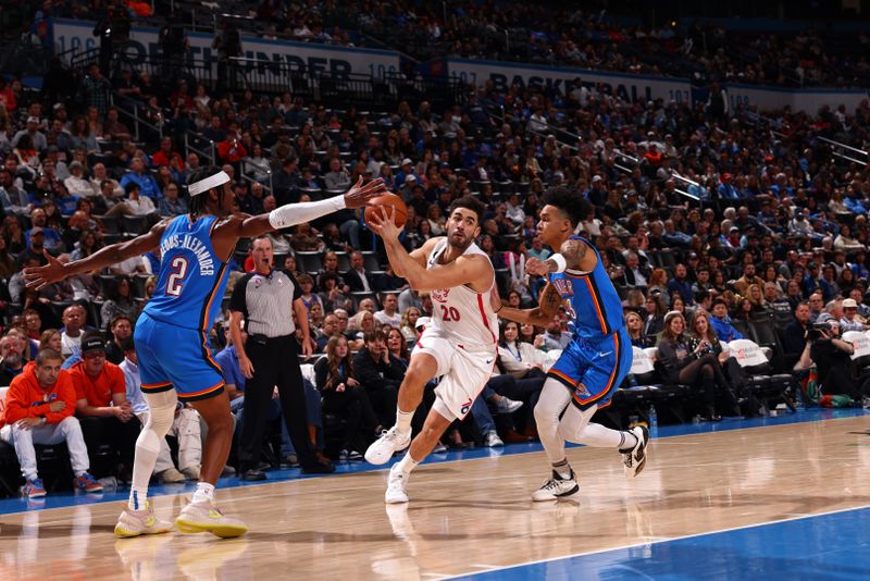 OKLAHOMA CITY, OK - DECEMBER 31: Georges Niang #20 of the Philadelphia 76ers drives to the basket on December 31, 2022 at Paycom Arena in Oklahoma City, Oklahoma. NOTE TO USER: User expressly acknowledges and agrees that, by downloading and or using this photograph, User is consenting to the terms and conditions of the Getty Images License Agreement. Mandatory Copyright Notice: Copyright 2022 NBAE (Photo by Zach Beeker/NBAE via Getty Images)