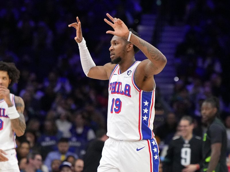 PHILADELPHIA, PA - FEBRUARY 2: Justin Edwards #19 of the Philadelphia 76ers celebrates three point basket during the game against the Boston Celtics on February 2, 2025 at the Wells Fargo Center in Philadelphia, Pennsylvania NOTE TO USER: User expressly acknowledges and agrees that, by downloading and/or using this Photograph, user is consenting to the terms and conditions of the Getty Images License Agreement. Mandatory Copyright Notice: Copyright 2025 NBAE(Photo by Jesse D. Garrabrant/NBAE via Getty Images)