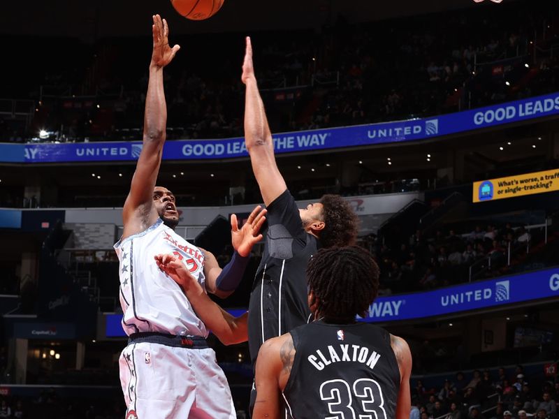 WASHINGTON, DC -? FEBRUARY 24: Khris Middleton #32 of the Washington Wizards shoots the ball during the game against the Brooklyn Nets on February 24, 2025 at Capital One Arena in Washington, DC. NOTE TO USER: User expressly acknowledges and agrees that, by downloading and or using this Photograph, user is consenting to the terms and conditions of the Getty Images License Agreement. Mandatory Copyright Notice: Copyright 2025 NBAE (Photo by Kenny Giarla/NBAE via Getty Images)