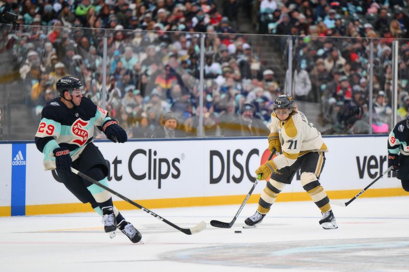 Jan 1, 2024; Seattle, Washington, USA; Seattle Kraken left wing Max McCormick (71) advances the puck while guarded by Seattle Kraken defenseman Vince Dunn (29) during the 3rd period in the 2024 Winter Classic ice hockey game at T-Mobile Park. Mandatory Credit: Steven Bisig-USA TODAY Sports