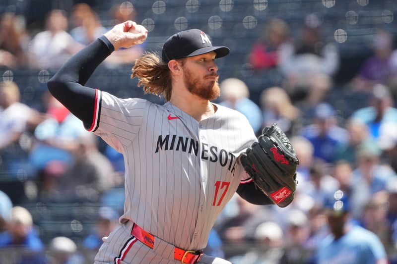 Apr 10, 2025; Kansas City, Missouri, USA; Minnesota Twins starting pitcher Bailey Ober (17) delivers a pitch against the Kansas City Royals in the first inning at Kauffman Stadium. Mandatory Credit: Denny Medley-Imagn Images