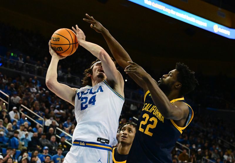 Feb 18, 2023; Los Angeles, California, USA;  UCLA Bruins guard Jaime Jaquez Jr. (24) shoots against California Golden Bears forward ND Okafor (22) in a college basketball game at Pauley Pavilion presented by Wescom. Mandatory Credit: Richard Mackson-USA TODAY Sports