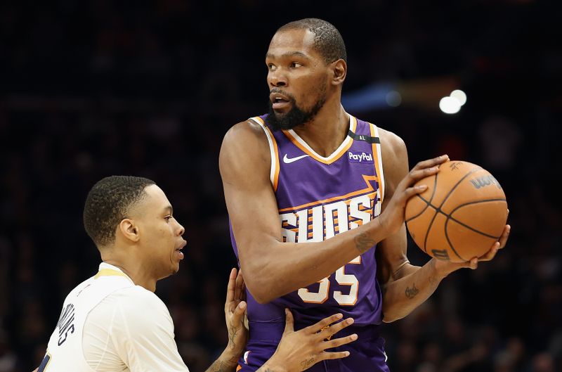 PHOENIX, ARIZONA - FEBRUARY 27: Kevin Durant #35 of the Phoenix Suns handles the ball during the first half of the NBA game at Footprint Center on February 27, 2025 in Phoenix, Arizona. NOTE TO USER: User expressly acknowledges and agrees that, by downloading and or using this photograph, User is consenting to the terms and conditions of the Getty Images License Agreement.  (Photo by Christian Petersen/Getty Images)