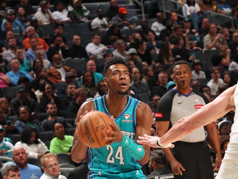 CHARLOTTE, NC - MARCH 15: Brandon Miller #24 of the Charlotte Hornets handles the ball during the game against the Phoenix Suns on March 15, 2024 at Spectrum Center in Charlotte, North Carolina. NOTE TO USER: User expressly acknowledges and agrees that, by downloading and or using this photograph, User is consenting to the terms and conditions of the Getty Images License Agreement. Mandatory Copyright Notice: Copyright 2024 NBAE (Photo by Kent Smith/NBAE via Getty Images)