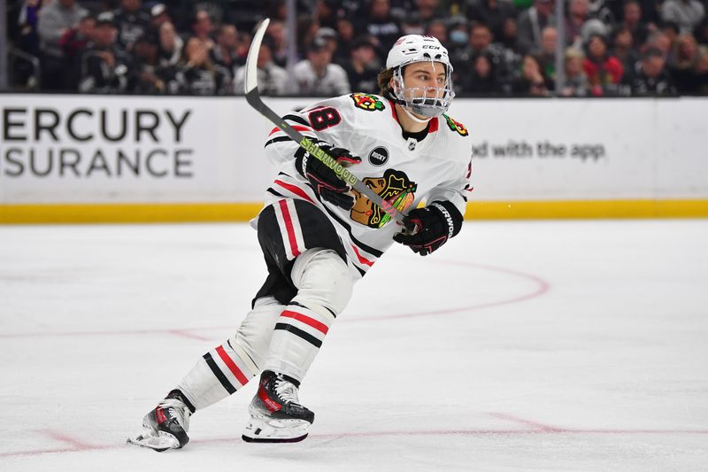 Apr 18, 2024; Los Angeles, California, USA; Chicago Blackhawks center Connor Bedard (98) in action against the Los Angeles Kings during the third period at Crypto.com Arena. Mandatory Credit: Gary A. Vasquez-USA TODAY Sports