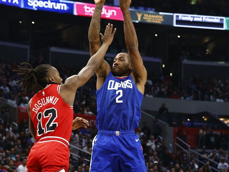 LOS ANGELES, CALIFORNIA - MARCH 09:  Kawhi Leonard #2 of the LA Clippers takes a shot against Ayo Dosunmu #12 of the Chicago Bulls in the second half at Crypto.com Arena on March 09, 2024 in Los Angeles, California.  NOTE TO USER: User expressly acknowledges and agrees that, by downloading and/or using this photograph, user is consenting to the terms and conditions of the Getty Images License Agreement.  (Photo by Ronald Martinez/Getty Images)