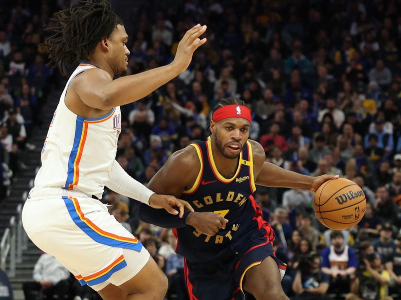 SAN FRANCISCO, CALIFORNIA - NOVEMBER 27: Buddy Hield #7 of the Golden State Warriors drives to the basket against Cason Wallace #22 of the Oklahoma City Thunder during the second half at Chase Center on November 27, 2024 in San Francisco, California. NOTE TO USER: User expressly acknowledges and agrees that, by downloading and or using this photograph, User is consenting to the terms and conditions of the Getty Images License Agreement (Photo by Ezra Shaw/Getty Images)