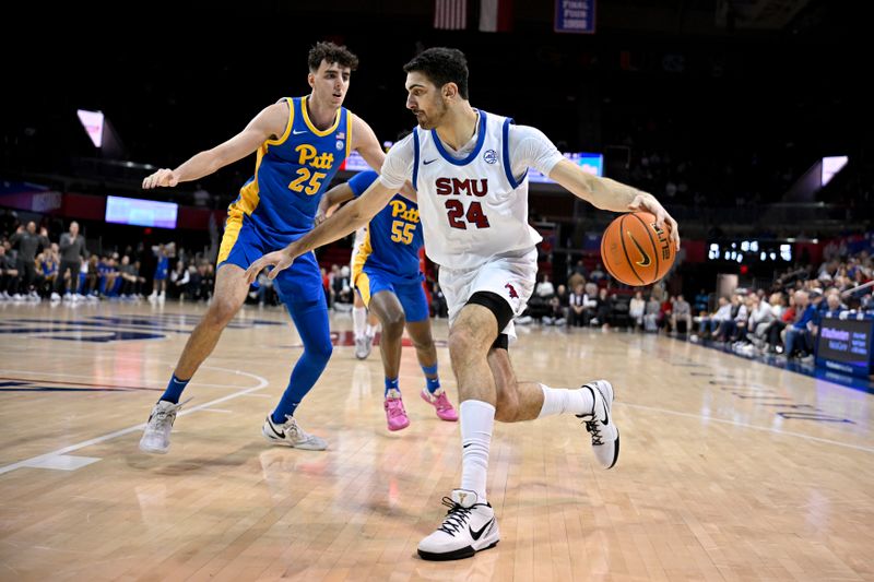 Feb 11, 2025; Dallas, Texas, USA; Southern Methodist Mustangs center Samet Yigitoglu (24) moves the ball past Pittsburgh Panthers forward Guillermo Diaz Graham (25) during the second half at Moody Coliseum. Mandatory Credit: Jerome Miron-Imagn Images