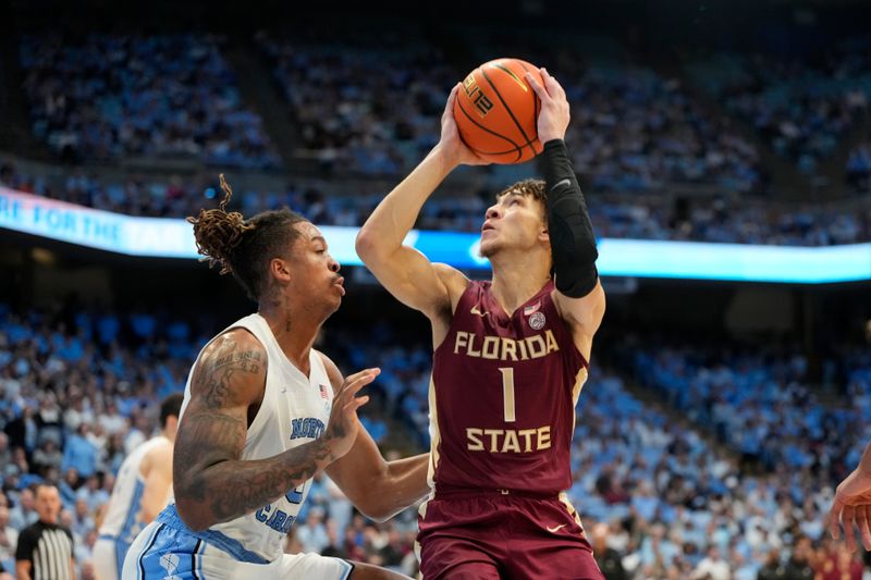 Dec 2, 2023; Chapel Hill, North Carolina, USA;  Florida State Seminoles guard Jalen Warley (1) looks to shoot as c5/ defends in the first half at Dean E. Smith Center. Mandatory Credit: Bob Donnan-USA TODAY Sports