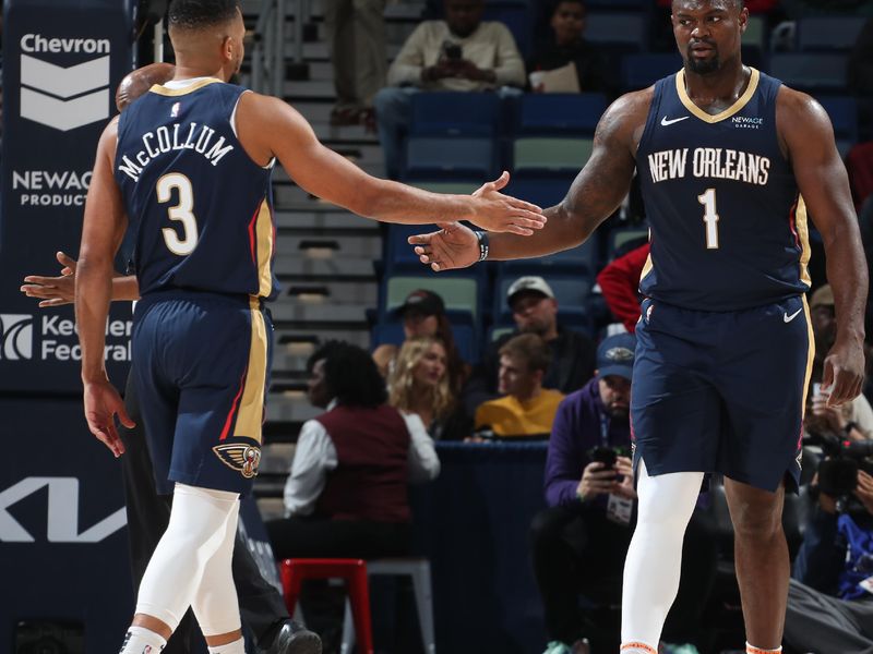 NEW ORLEANS, LA - JANUARY 17:  Zion Williamson #1 and CJ McCollum #3 of the New Orleans Pelicans high five during the game against the Utah Jazz on January 17, 2025 at the Smoothie King Center in New Orleans, Louisiana. NOTE TO USER: User expressly acknowledges and agrees that, by downloading and or using this Photograph, user is consenting to the terms and conditions of the Getty Images License Agreement. Mandatory Copyright Notice: Copyright 2025 NBAE (Photo by Layne Murdoch Jr./NBAE via Getty Images)