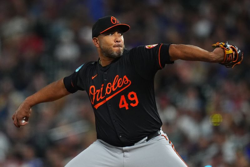 Aug 30, 2024; Denver, Colorado, USA; Baltimore Orioles starting pitcher Albert Suarez (49) delivers a pitch the sixth inning against the Colorado Rockies at Coors Field. Mandatory Credit: Ron Chenoy-USA TODAY Sports