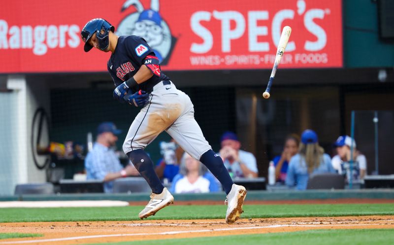 May 14, 2024; Arlington, Texas, USA;  Cleveland Guardians center fielder Tyler Freeman (2) throws his bat after walking  during the second inning against the Texas Rangers at Globe Life Field. Mandatory Credit: Kevin Jairaj-USA TODAY Sports