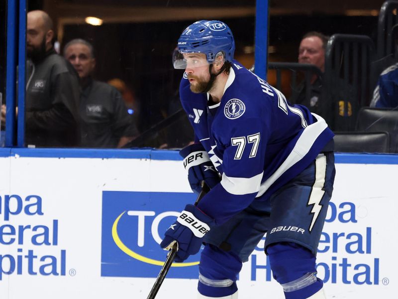 Jan 16, 2025; Tampa, Florida, USA; Tampa Bay Lightning defenseman Victor Hedman (77) skates with the puck against the Anaheim Ducks during overtime at Amalie Arena. Mandatory Credit: Kim Klement Neitzel-Imagn Images