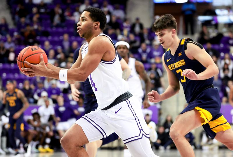 Feb 12, 2024; Fort Worth, Texas, USA;  TCU Horned Frogs guard Jameer Nelson Jr. (4) drives to the basket past West Virginia Mountaineers guard Kerr Kriisa (3) during the first half at Ed and Rae Schollmaier Arena. Mandatory Credit: Kevin Jairaj-USA TODAY Sports