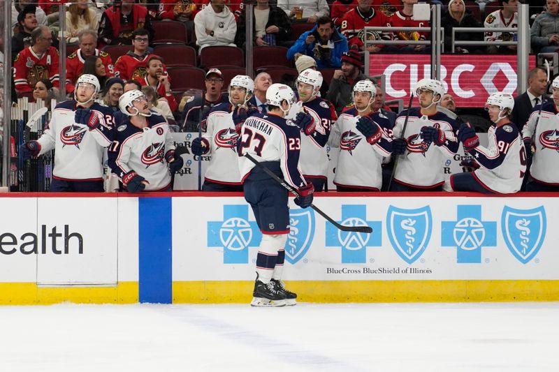 Dec 1, 2024; Chicago, Illinois, USA; Columbus Blue Jackets center Sean Monahan (23) celebrates his goal against the Chicago Blackhawks during the second period at United Center. Mandatory Credit: David Banks-Imagn Images