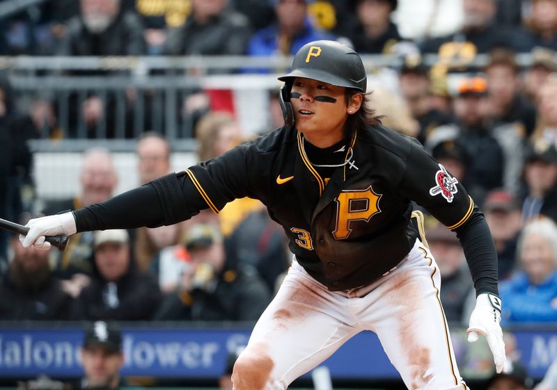 Apr 7, 2023; Pittsburgh, Pennsylvania, USA;  Pittsburgh Pirates second baseman Ji Hwan Bae (3) hits a single against the Chicago White Sox during the fourth inning at PNC Park. Mandatory Credit: Charles LeClaire-USA TODAY Sports