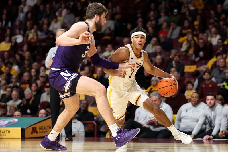 Feb 25, 2025; Minneapolis, Minnesota, USA; Minnesota Golden Gophers guard Isaac Asuma (1) works around Northwestern Wildcats center Matthew Nicholson (34) during the first half at Williams Arena. Mandatory Credit: Matt Krohn-Imagn Images