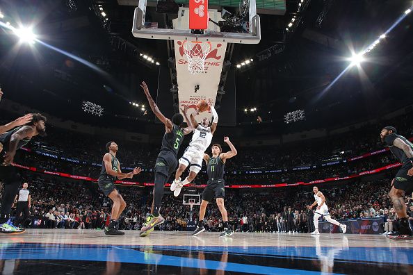 NEW ORLEANS, LA - DECEMBER 19: Ja Morant #12 of the Memphis Grizzlies scores the game winning basket during the game against the New Orleans Pelicans on December 19, 2023 at the Smoothie King Center in New Orleans, Louisiana. NOTE TO USER: User expressly acknowledges and agrees that, by downloading and or using this Photograph, user is consenting to the terms and conditions of the Getty Images License Agreement. Mandatory Copyright Notice: Copyright 2023 NBAE (Photo by Layne Murdoch Jr./NBAE via Getty Images)