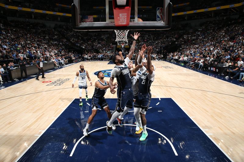 MINNEAPOLIS, MN -  OCTOBER 29: Naji Marshall #13 of the Dallas Mavericks goes up for the rebound during the game against the Minnesota Timberwolves on October 29, 2024 at Target Center in Minneapolis, Minnesota. NOTE TO USER: User expressly acknowledges and agrees that, by downloading and or using this Photograph, user is consenting to the terms and conditions of the Getty Images License Agreement. Mandatory Copyright Notice: Copyright 2024 NBAE (Photo by David Sherman/NBAE via Getty Images)