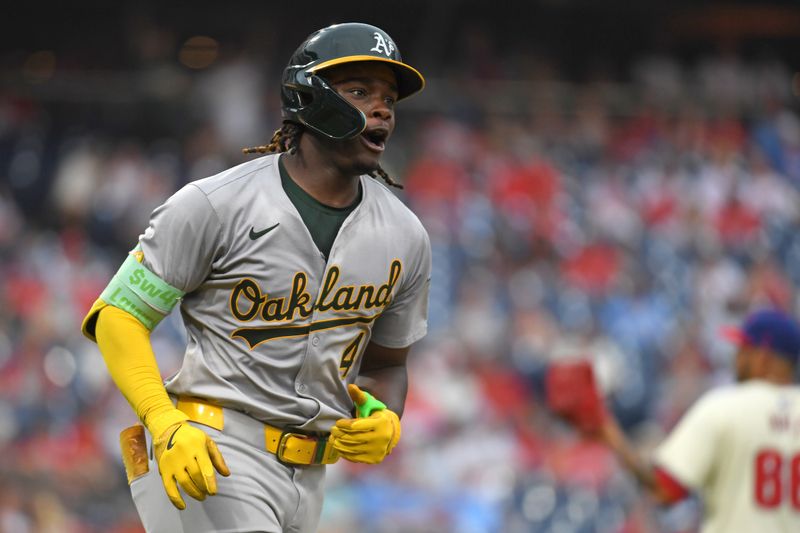 Jul 14, 2024; Philadelphia, Pennsylvania, USA; Oakland Athletics outfielder Lawrence Butler (4) celebrates his third home run of the game against the Philadelphia Phillies during the seventh inning at Citizens Bank Park. Mandatory Credit: Eric Hartline-USA TODAY Sports