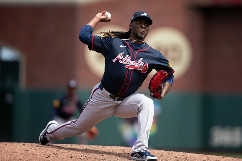 Jun 8, 2025; San Francisco, California, USA; Atlanta Braves pitcher Rafael Montero (48) delivers a pitch against the San Francisco Giants during the seventh inning at Oracle Park. Mandatory Credit: D. Ross Cameron-Imagn Images