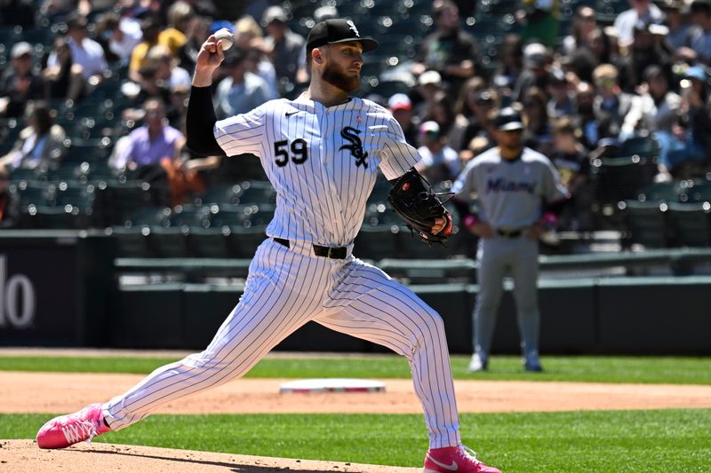 May 11, 2025; Chicago, Illinois, USA;  Chicago White Sox pitcher Sean Burke (59) delivers against the Miami Marlins during the first inning at Rate Field. Mandatory Credit: Matt Marton-Imagn Images