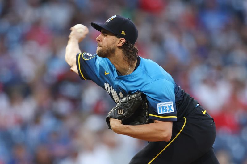 Sep 13, 2024; Philadelphia, Pennsylvania, USA; Philadelphia Phillies pitcher Aaron Nola (27) throws a pitch during the first inning against the New York Mets at Citizens Bank Park. Mandatory Credit: Bill Streicher-Imagn Images