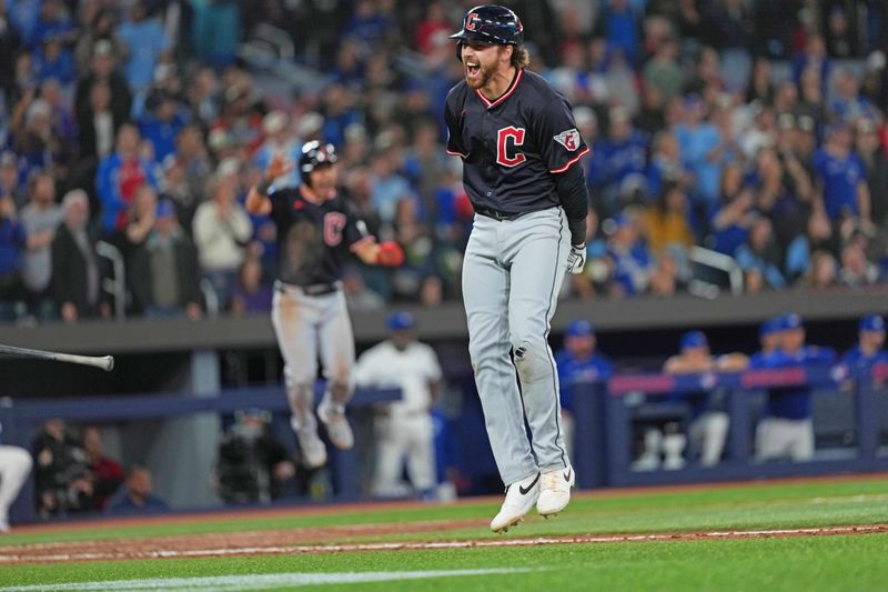 May 3, 2025; Toronto, Ontario, CAN; Cleveland Guardians second baseman Daniel Schneemann (10) celebrates hitting a grand slam hone run against the Toronto Blue Jays at during the ninth inning at Rogers Centre. Mandatory Credit: Nick Turchiaro-Imagn Images