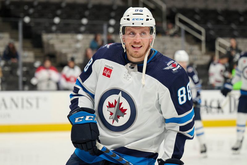 Dec 12, 2023; San Jose, California, USA; Winnipeg Jets defenseman Nate Schmidt (88) skates during warmups before the game between the San Jose Sharks and the Winnipeg Jets at SAP Center at San Jose. Mandatory Credit: Robert Edwards-USA TODAY Sports