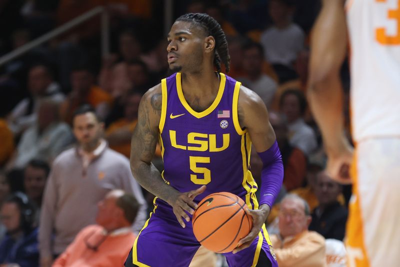 Feb 7, 2024; Knoxville, Tennessee, USA; LSU Tigers forward Mwani Wilkinson (5) looks to moves the ball against the Tennessee Volunteers during the second half at Thompson-Boling Arena at Food City Center. Mandatory Credit: Randy Sartin-USA TODAY Sports