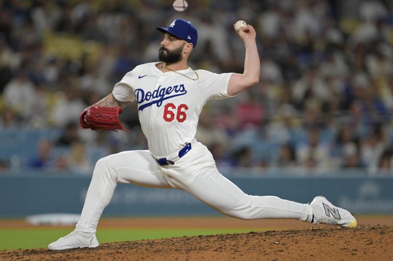 May 21, 2025; Los Angeles, California, USA;  Los Angeles Dodgers relief pitcher Tanner Scott (66) earns a save in the ninth inning against the Arizona Diamondbacks at Dodger Stadium. Mandatory Credit: Jayne Kamin-Oncea-Imagn Images