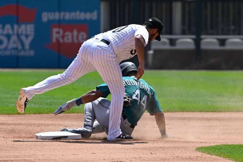 Aug 23, 2023; Chicago, Illinois, USA;  Seattle Mariners center fielder Julio Rodriguez (44) steals second base under Chicago White Sox second baseman Lenyn Sosa (50) during the first inning at Guaranteed Rate Field. Mandatory Credit: Matt Marton-USA TODAY Sports
