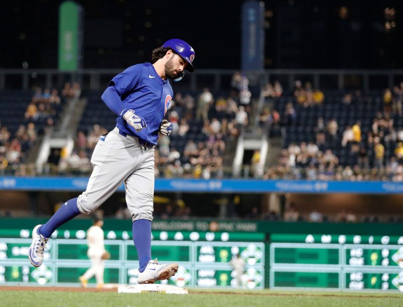 Aug 26, 2024; Pittsburgh, Pennsylvania, USA;  Chicago Cubs shortstop Dansby Swanson (7) circles the bases on a grand slam home run against the Pittsburgh Pirates during the sixth inning at PNC Park. Mandatory Credit: Charles LeClaire-USA TODAY Sports