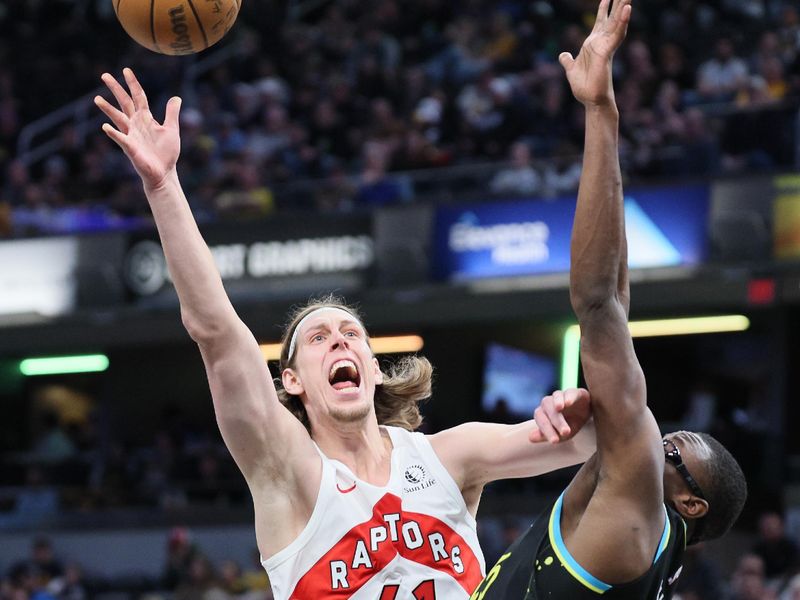 INDIANAPOLIS, INDIANA - FEBRUARY 26:  Kelly Olynyk #41 of the Toronto Raptors shoots the ball while defended by Jalen Smith #25 of  the Indiana Pacers at Gainbridge Fieldhouse on February 26, 2024 in Indianapolis, Indiana.    NOTE TO USER: User expressly acknowledges and agrees that, by downloading and or using this photograph, User is consenting to the terms and conditions of the Getty Images License Agreement.  (Photo by Andy Lyons/Getty Images)