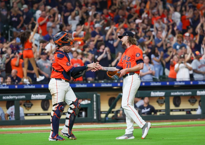 Jun 14, 2024; Houston, Texas, USA;  Houston Astros catcher Victor Caratini (17) and relief pitcher Josh Hader (71) celebrate the win against the Detroit Tigers in the ninth inning at Minute Maid Park. Mandatory Credit: Thomas Shea-USA TODAY Sports