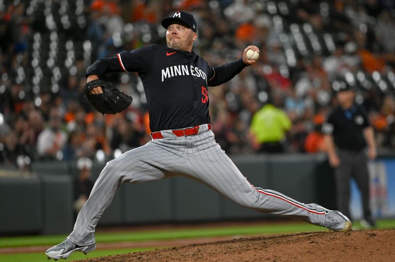 Apr 16, 2024; Baltimore, Maryland, USA;  Minnesota Twins pitcher Caleb Thielbar (56) throws a eighth inning pitch against the Baltimore Orioles at Oriole Park at Camden Yards. Mandatory Credit: Tommy Gilligan-USA TODAY Sports